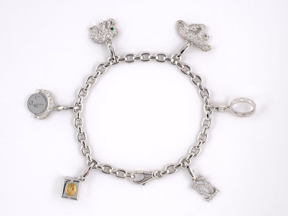 73110 - SOLD - Cartier Gold Diamond Emerald Charm Bracelet
