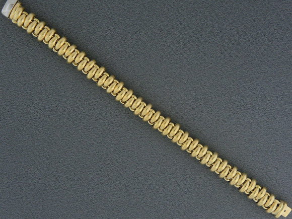 73169 - Circa 1980s Gold Woven Circle Link Bracelet