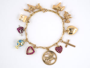 73204 - SOLD - Circa1960s Cartier Gold Diamond Ruby Charm Bracelet