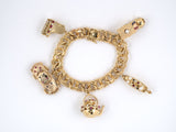 73559 - SOLD - Circa 1950s Gold Diamond Ruby Sapphire Pearl Charm Bracelet