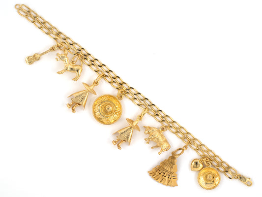73599 - SOLD - Circa 1960s Gold Assorted Mexican Charm Bracelet