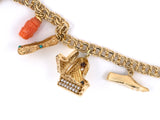 73632 - Circa 1950s Gold Diamond Ruby Sapphire Turquoise Pearl Coral Garnet Charm Bracelet