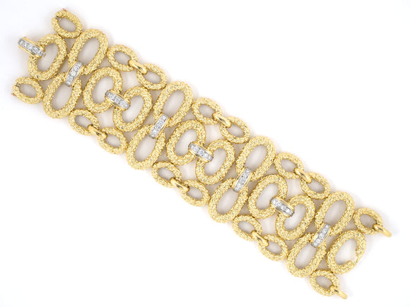 73746 - Circa 1965 French Platinum Gold Diamond Open Oval Link Textured Bracelet
