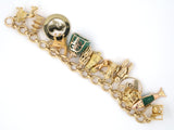 73764 - SOLD - Circa 1960s Gold Ruby Aventurine14 Assorted Animal Travel Charm Bracelet