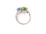 92498 - Circa 1950s Platinum Diamond Peridot Aqua By Pass 2-Stone Ring