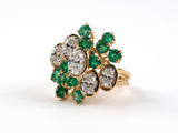 93491 - Circa 1976 Oscar Heyman Platinum Gold Diamond Emerald Cluster Twist Ring